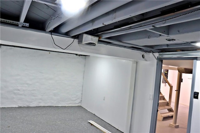3417 Jackson Ave, Kansas City, MO 64128 - finished below grade area featuring stairs