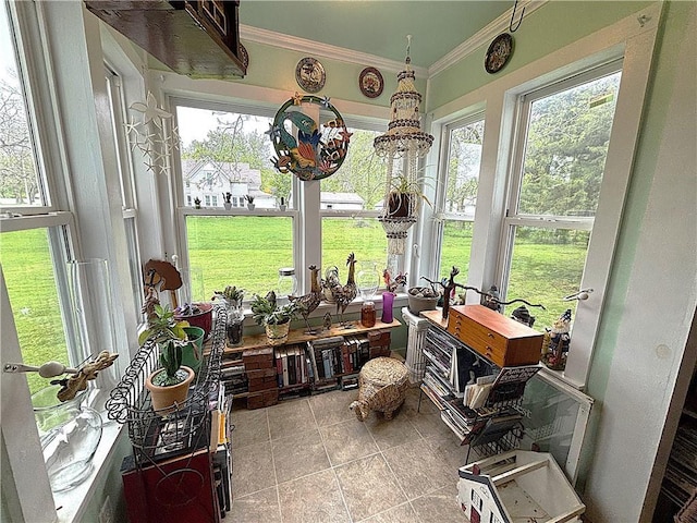 109 S State Route F, Garden City, MO 64747 - sunroom / solarium with tile patterned flooring, ornamental molding, and a healthy amount of sunlight