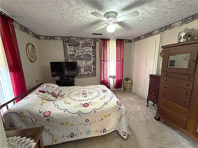 109 S State Route F, Garden City, MO 64747 - carpeted bedroom featuring ceiling fan and visible vents