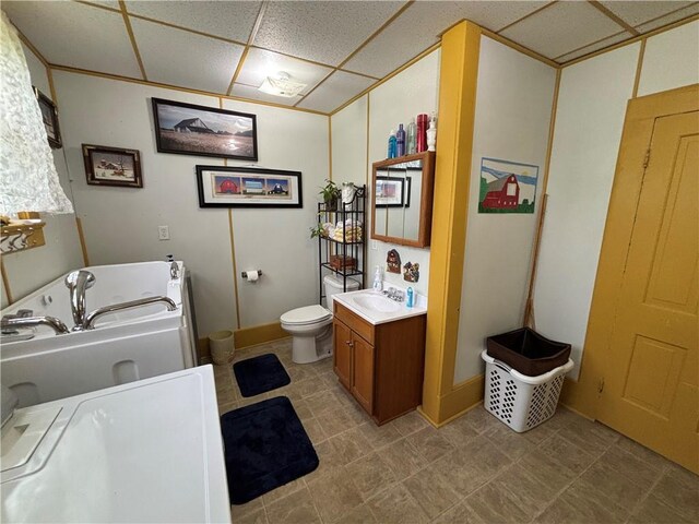 109 S State Route F, Garden City, MO 64747 - full bath with toilet, a tub with jets, a drop ceiling, and vanity