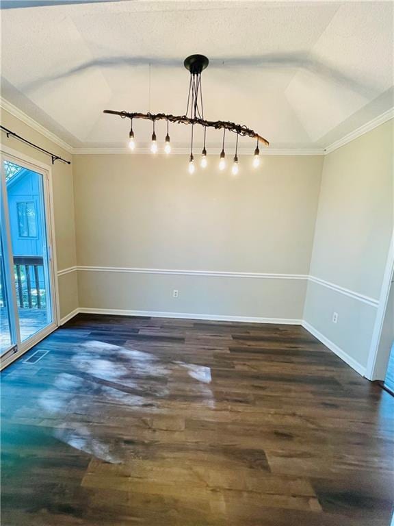 unfurnished dining area with crown molding, baseboards, lofted ceiling, and dark wood-type flooring
