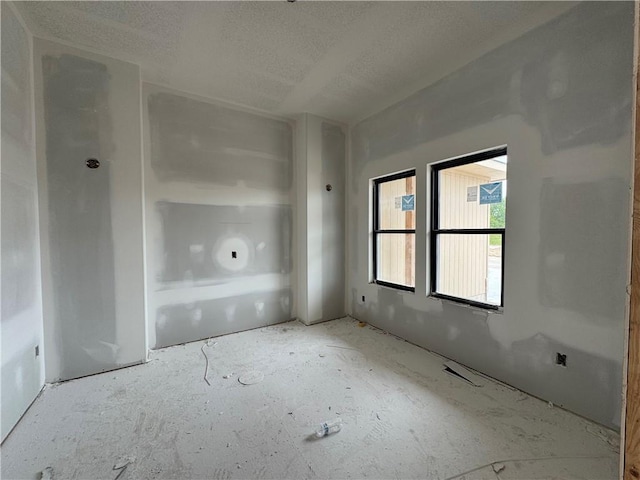 13610 NE 114th Pl, Kearney, MO 64060 - spare room with a textured ceiling
