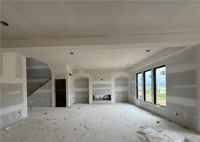 13610 NE 114th Pl, Kearney, MO 64060 - unfurnished living room with a textured ceiling