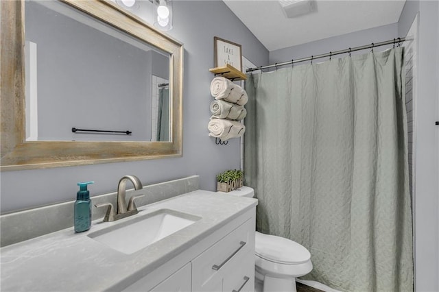 full bathroom with vanity, a shower with curtain, and toilet