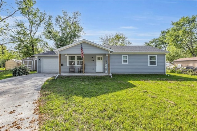 ranch-style house with an attached garage, a front lawn, a storage shed, a porch, and concrete driveway