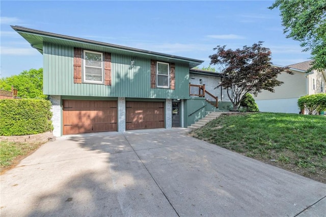 213 Lake Village Blvd, Blue Springs, MO 64014 - split level home with driveway, stairs, and a garage