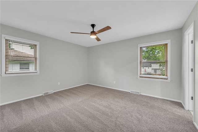 213 Lake Village Blvd, Blue Springs, MO 64014 - unfurnished room featuring carpet flooring, a ceiling fan, and visible vents