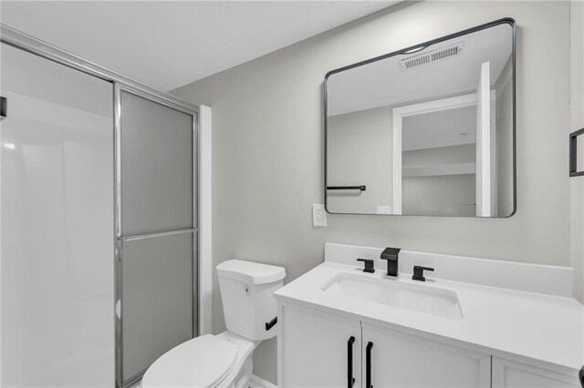 213 Lake Village Blvd, Blue Springs, MO 64014 - full bathroom featuring visible vents, a stall shower, and toilet