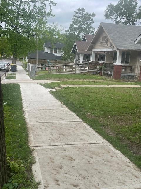 2120 68th Ter, Kansas City, MO 64132 - surrounding community featuring fence and a yard