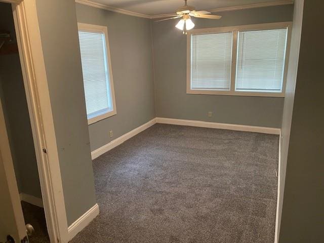 2120 68th Ter, Kansas City, MO 64132 - carpeted empty room with crown molding, a ceiling fan, and baseboards