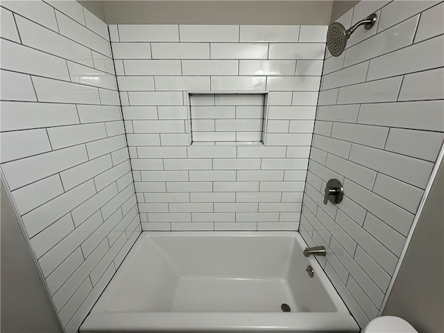 bathroom with shower / tub combination