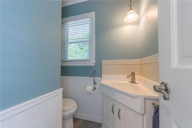 11801 Avila Dr, Kansas City, MO 64114 - bathroom with vanity and wainscoting