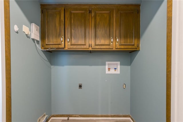 11801 Avila Dr, Kansas City, MO 64114 - washroom featuring hookup for a washing machine, electric dryer hookup, and cabinet space