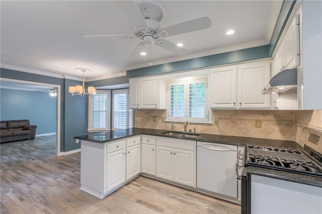 11801 Avila Dr, Kansas City, MO 64114 - kitchen with dishwasher, stainless steel gas range oven, under cabinet range hood, ceiling fan, and a peninsula