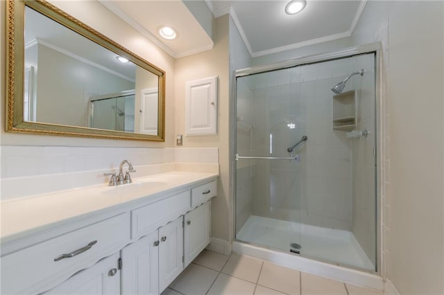 11801 Avila Dr, Kansas City, MO 64114 - full bathroom featuring crown molding, a shower stall, vanity, and tile patterned flooring