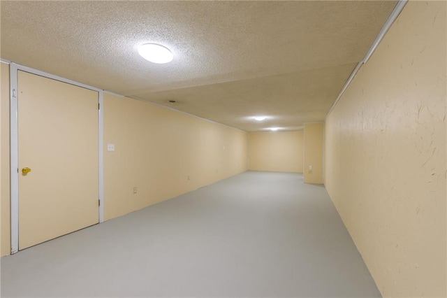11801 Avila Dr, Kansas City, MO 64114 - finished below grade area featuring a textured ceiling