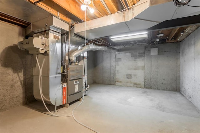 11801 Avila Dr, Kansas City, MO 64114 - unfinished basement with heating unit and water heater