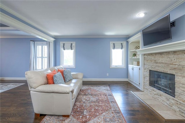 5701 W 148th Pl, Overland Park, KS 66223 - living room featuring crown molding, a stone fireplace, and dark wood-type flooring