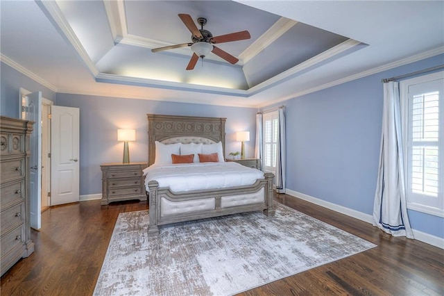 5701 W 148th Pl, Overland Park, KS 66223 - bedroom with a tray ceiling, multiple windows, dark wood finished floors, and crown molding