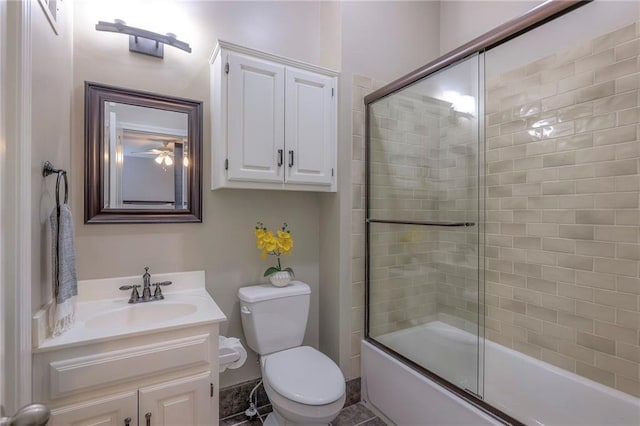 5701 W 148th Pl, Overland Park, KS 66223 - bathroom featuring vanity, combined bath / shower with glass door, and a ceiling fan