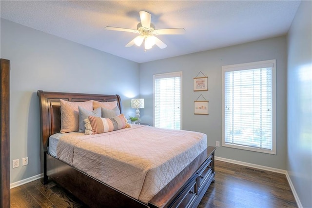 5701 W 148th Pl, Overland Park, KS 66223 - bedroom featuring dark wood finished floors and ceiling fan