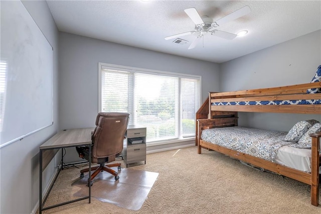 5701 W 148th Pl, Overland Park, KS 66223 - bedroom with carpet floors, a desk, a ceiling fan, and a textured ceiling