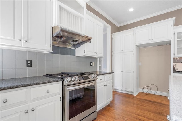 7406 W 145th Ter, Overland Park, KS 66223 - kitchen featuring stainless steel range with gas cooktop, white cabinets, wall chimney range hood, crown molding, and tasteful backsplash