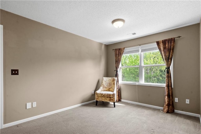 7406 W 145th Ter, Overland Park, KS 66223 - living area with carpet flooring, a textured ceiling, and baseboards