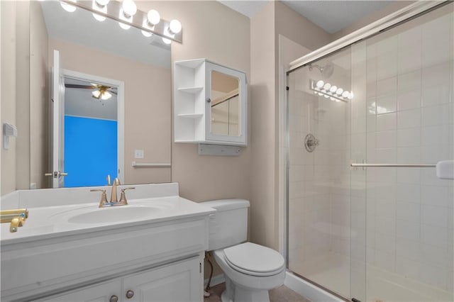 7406 W 145th Ter, Overland Park, KS 66223 - full bathroom with a shower stall, toilet, vanity, and a ceiling fan