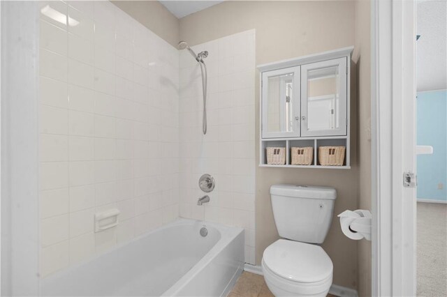 7406 W 145th Ter, Overland Park, KS 66223 - bathroom featuring toilet, shower / washtub combination, and baseboards