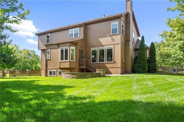 7406 W 145th Ter, Overland Park, KS 66223 - back of property with a chimney
