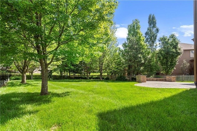 7406 W 145th Ter, Overland Park, KS 66223 - view of yard with a patio