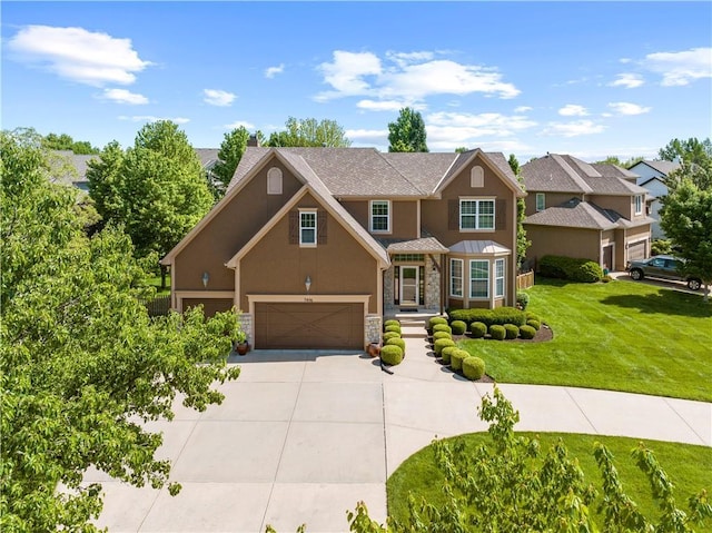 7406 W 145th Ter, Overland Park, KS 66223 - traditional-style home featuring stone siding, stucco siding, concrete driveway, a garage, and a front lawn