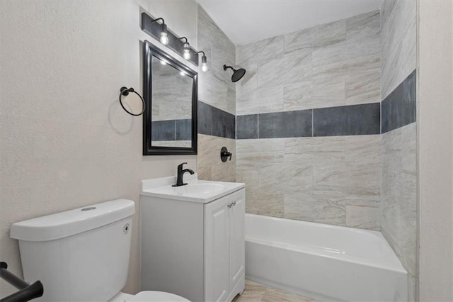 full bathroom with toilet, tub / shower combination, and vanity