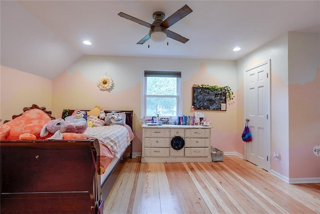 bedroom featuring ceiling fan, light wood-style floors, recessed lighting, baseboards, and vaulted ceiling