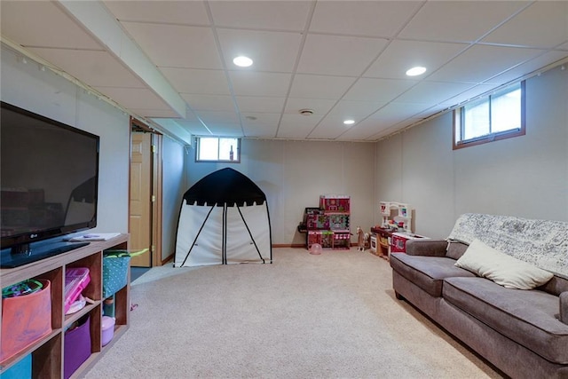 rec room featuring carpet floors, a drop ceiling, and recessed lighting