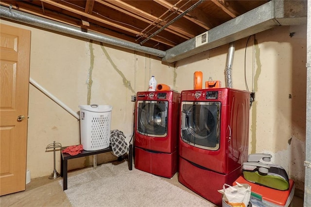 laundry area featuring laundry area, separate washer and dryer, and visible vents