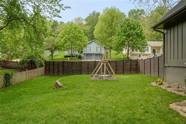 view of yard with a fenced backyard