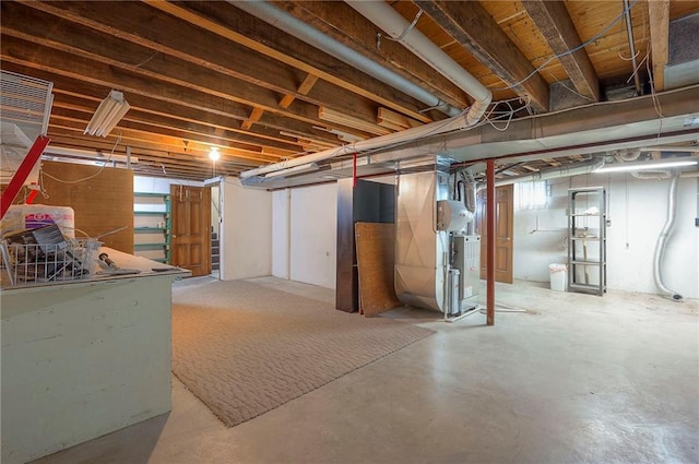3913 Stonewall Ave, Independence, MO 64055 - unfinished basement featuring heating unit