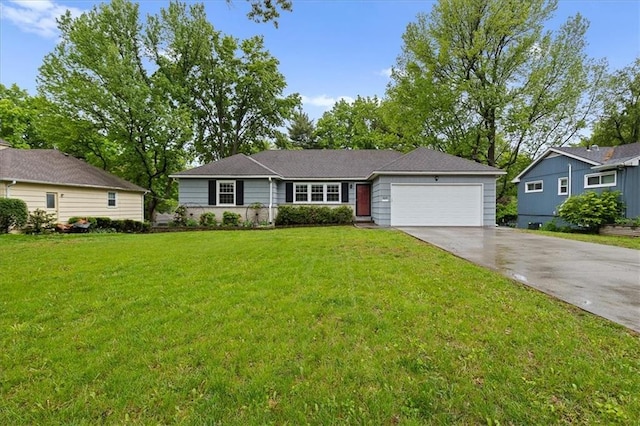 single story home featuring a garage, concrete driveway, and a front yard