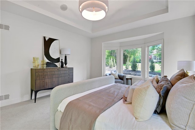 17045 S Highland Ridge Dr, Loch Lloyd, MO 64012 - bedroom featuring carpet floors, a raised ceiling, and baseboards