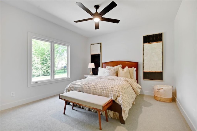 17045 S Highland Ridge Dr, Loch Lloyd, MO 64012 - carpeted bedroom with baseboards and a ceiling fan