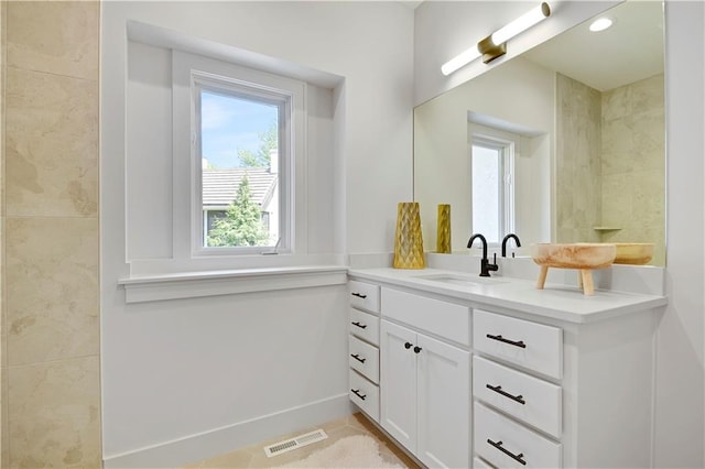 17045 S Highland Ridge Dr, Loch Lloyd, MO 64012 - bathroom featuring vanity and baseboards