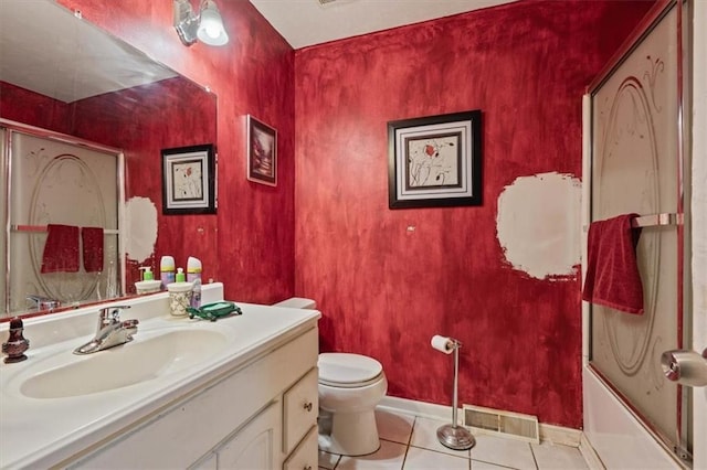 bathroom featuring tile patterned floors, baseboards, toilet, and visible vents