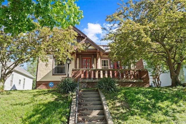 2717 Faraon St, Saint Joseph, MO 64501 - view of front of property with stucco siding and a front lawn