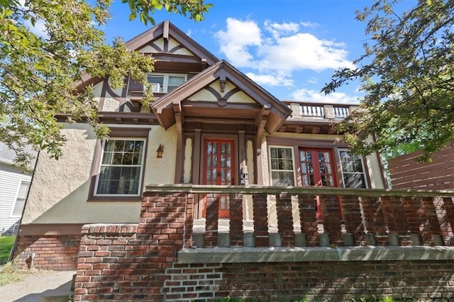 2717 Faraon St, Saint Joseph, MO 64501 - view of front of house with stucco siding and brick siding