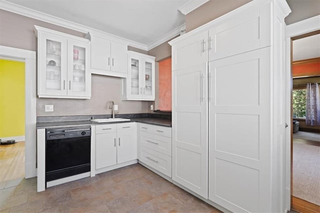 2717 Faraon St, Saint Joseph, MO 64501 - kitchen featuring black dishwasher, a sink, crown molding, white cabinetry, and dark countertops