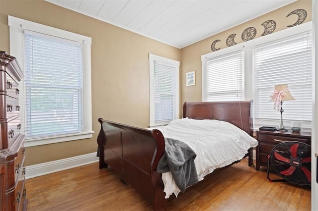 2717 Faraon St, Saint Joseph, MO 64501 - bedroom featuring wood finished floors and baseboards