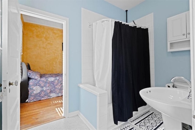 2717 Faraon St, Saint Joseph, MO 64501 - bathroom with curtained shower and a sink