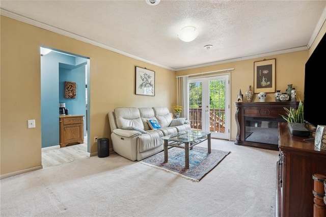 2106 Kasold Dr, Lawrence, KS 66047 - living area featuring crown molding, a textured ceiling, baseboards, and light carpet